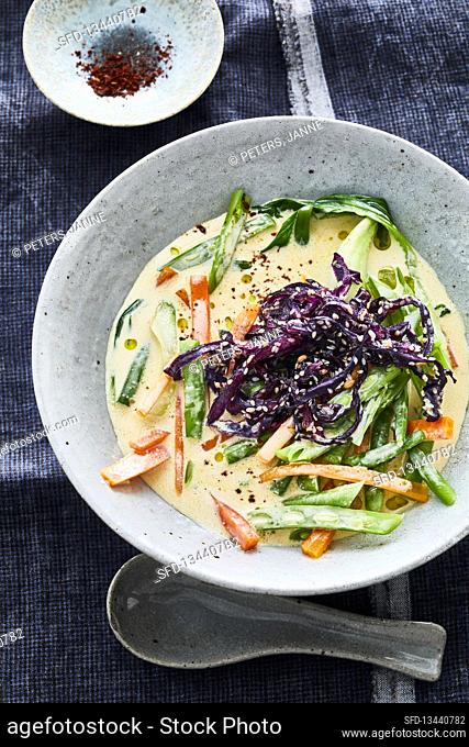Coconut bean stew with sweet and sour sesame cabbage and ginger