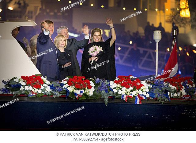 King Willem-Alexander (L) and Queen Maxima (R) of The Netherlands and Canadian Prime Minister Stephen Harper and his wife Laureen attend the liberation concert...