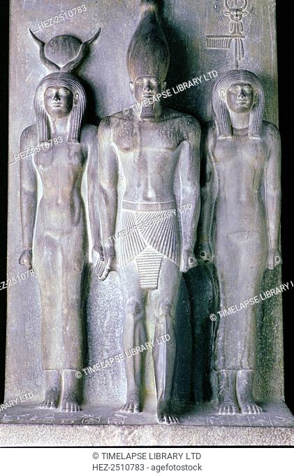 Basalt statue of the Pharaoh Menkaure, Cairo Museum, Egypt. Menkaure (Mycerinus) was a Pharaoh of the 4th dynasty of Ancient Egypt