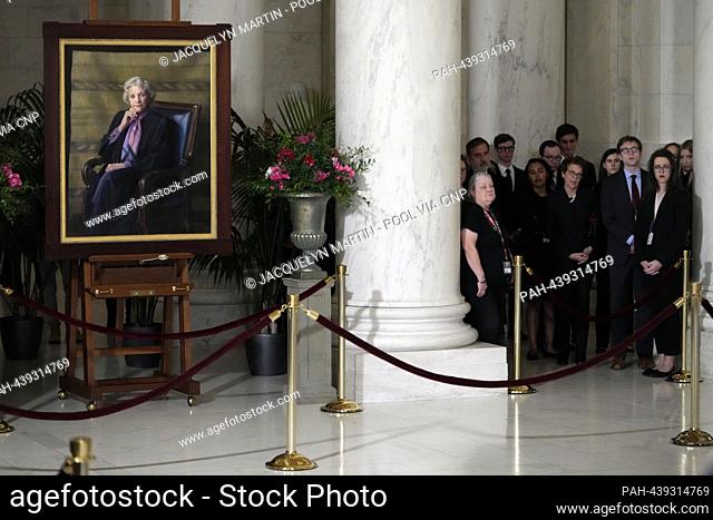 People listen during a private ceremony for former Associate Justice of the Supreme Court Sandra Day O'Connor in the Great Hall at the Supreme Court in...