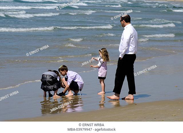 Jewish family on the beach, Netanya, Israel