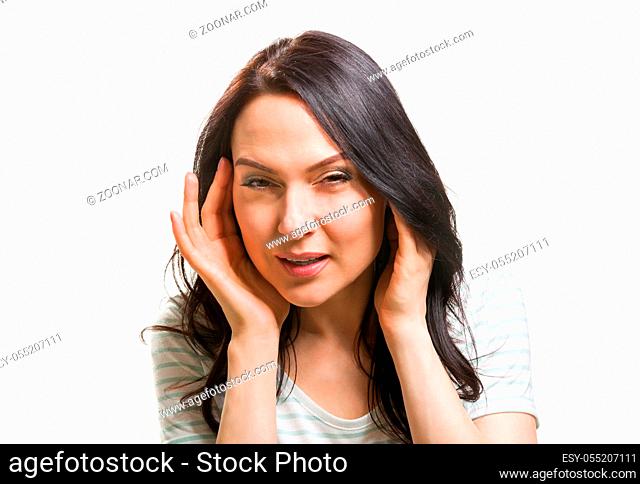 Woman without her glasses can't see Close up portrait isolated at white background