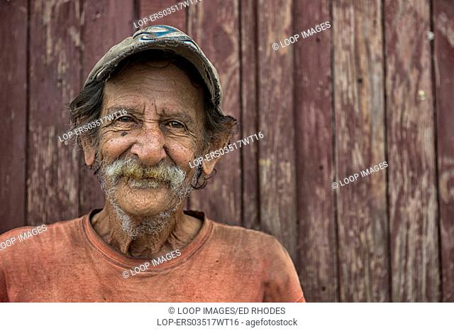 Local Cuban male smiling for photograph