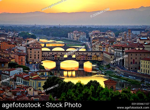 Florence cityscape and Arno river bridges sunset view, Ponte Vecchio, Tuscany region of Italy