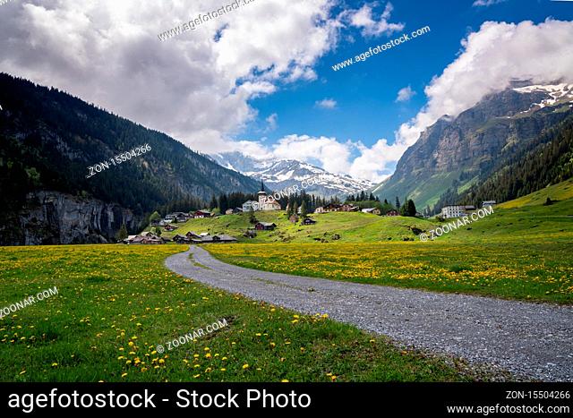 Urnerboden, UR / Switzerland - 17 May 2020: view of the Urnerboden village high up in the Swiss Alps in the canton of Uri in late spring