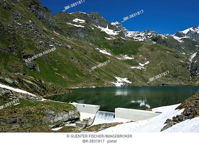 At Lac de Louvie mountain lake, Val de Bagnes valley, Canton of Valais, Switzerland