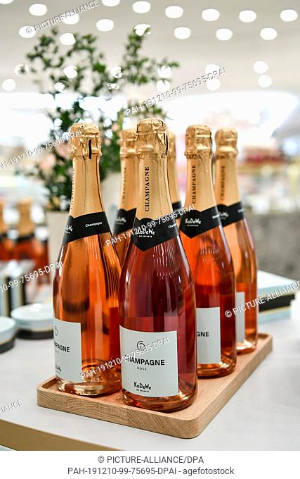09 December 2019, Berlin: Champagne under the brand KaDeWe is available in the food department ""Die Sechste"" in the department store ""Kaufhaus des Westens...