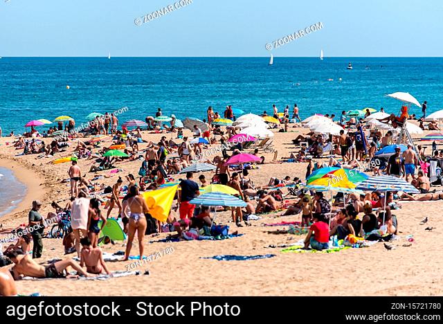 BARCELONA - JUNE 26, 2020: Barceloneta beach with people in summer after COVID 19 on June 26, 2020 in Barcelona, ??Spain