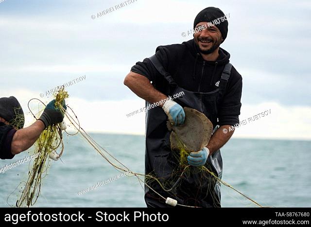 RUSSIA, GENICHESK - APRIL 30, 2023: A fisherman is seen in the Sea of Azov on the closing day of the season for catching turbot
