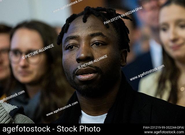 PRODUCTION - 19 December 2023, North Rhine-Westphalia, Dortmund: William Dountio, Justice4Mouhamed solidarity group, stands in the spectator area of the...