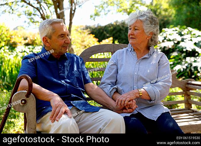 Senior caucasian couple spending time in garden together