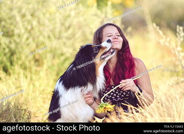 woman with Australian Shepherd
