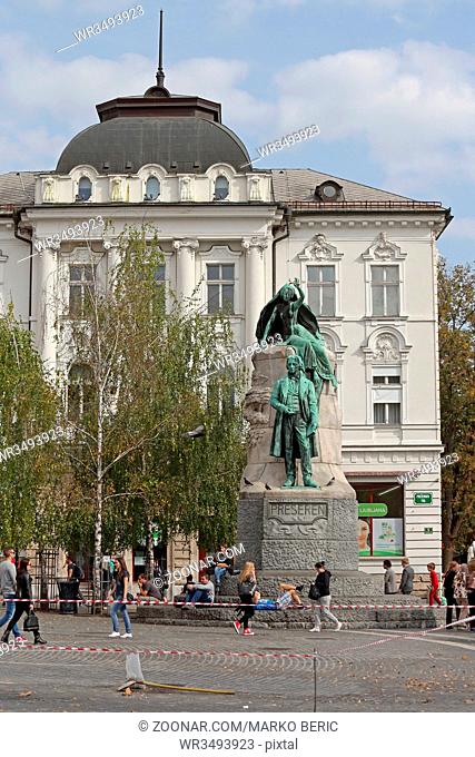 Ljubljana, Slovenia - October 13, 2014: People Walking by Famous Poet France Preseren Monument in Ljubljana, Slovenia