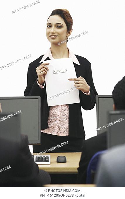 Portrait of a businesswoman giving a presentation