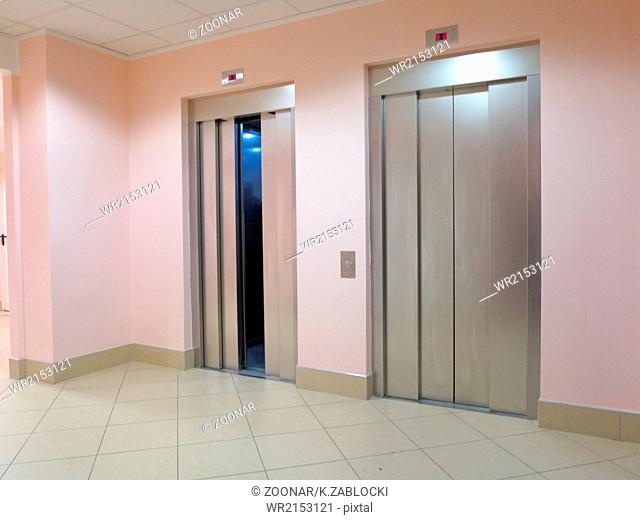 modern elevator with opened and closed doors