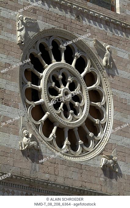 Rose window on a wall, Foligno, Umbria, Italy