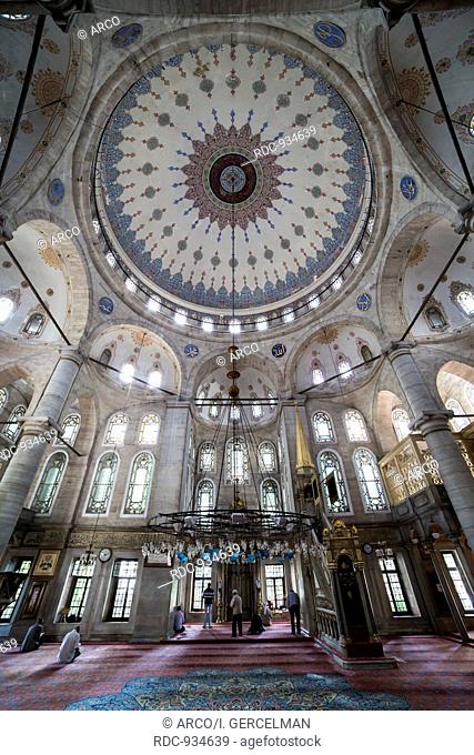 Istanbul, Turkey - May 24, 2013. People perform the ritual prayers of islam in Eyup Sultan Mosque on May 24, 2013. Eyup Sultan Mosque is one of the most...