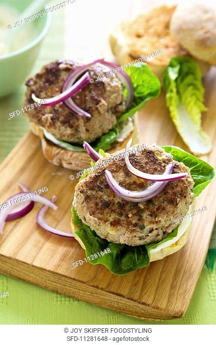 Pork and sage burgers with onions and mayonnaise