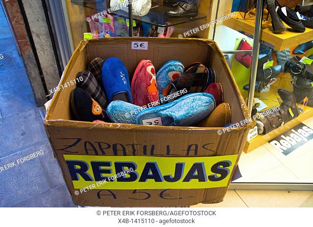 Slippers for 5 euros during winter sales Sant Pere district Barcelona Catalunya Spain Europe