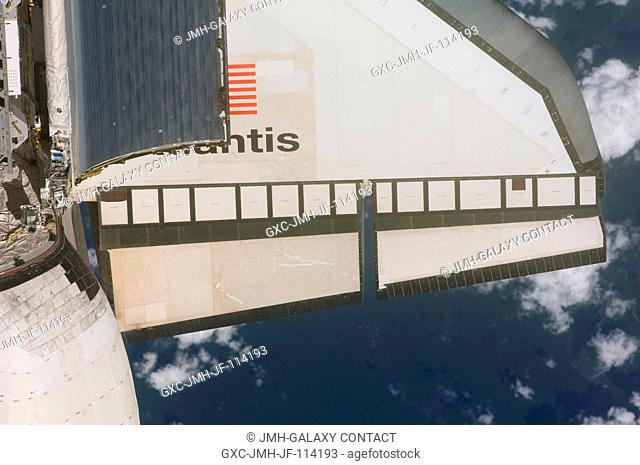 This partial view of the starboard wing of the Space Shuttle Atlantis was provided by an Expedition 21 crew member during a survey of the approaching STS-129...