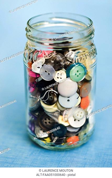 Glass jar of buttons