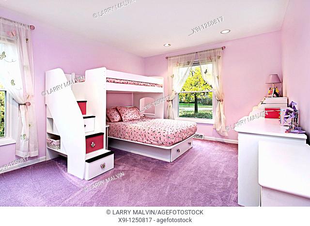 Girl's room in suburban home with bunk bed