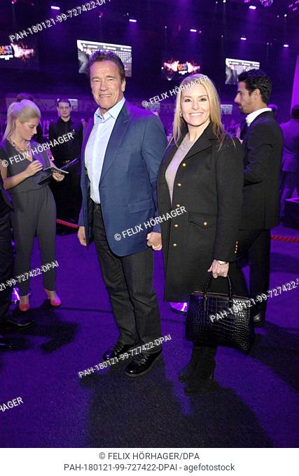 Actor Arnold Schwarzenegger (L) and his partner Heather Milligan attend the 'Kitz Race Club Party' in Kitzbuehl, Austria, 20 January 2018