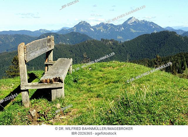Bench on Kreuzbergalm, mountain pasture, between Tegernsee und Schliersee, Wendelstein mountain range at back, Upper Bavaria, Germany, Europe