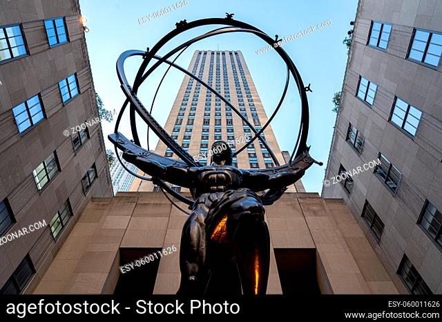 New York, United States - September 21, 2019: Low angle view of the Atlas Statue in Rockefeller Center. Created by Lee Lawrie in 1937