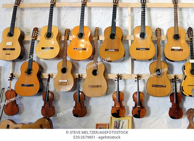The wall in a guitar maker's shop