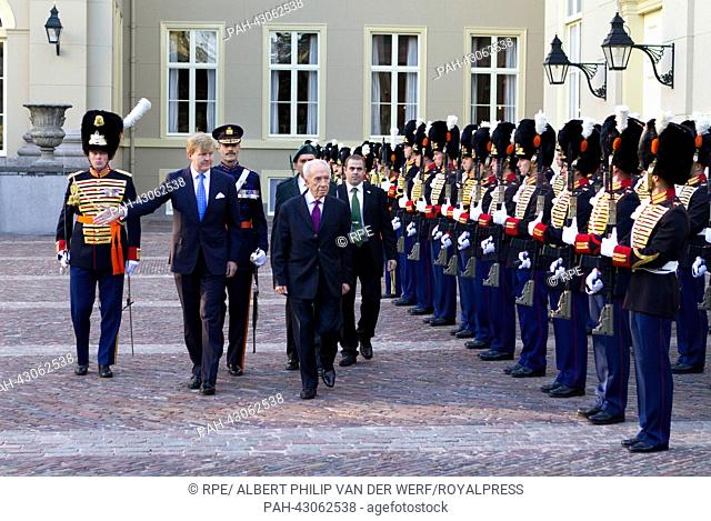 King Willem-Alexander of the Netherlands (R) recieves Israelian president Schimon Peres at Palace Noordeinde during his official visit to the Netherlands in The...