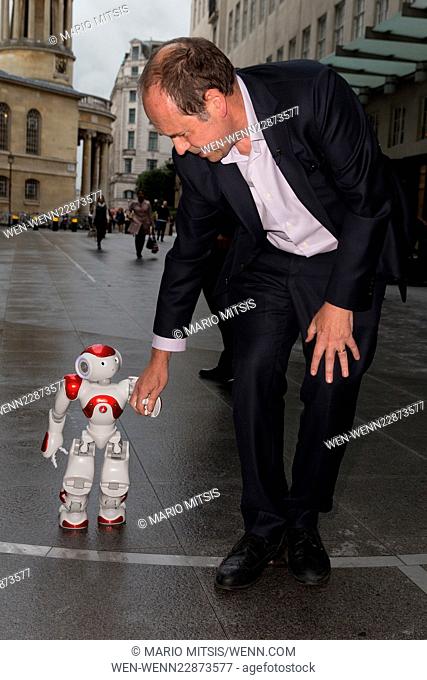 Rory Cellen Jones walking in an Active8 robot, made by Nao robots for Ai week at the BBC Studios. Appearing on Day with robots Jeremy Vine and Today programme...
