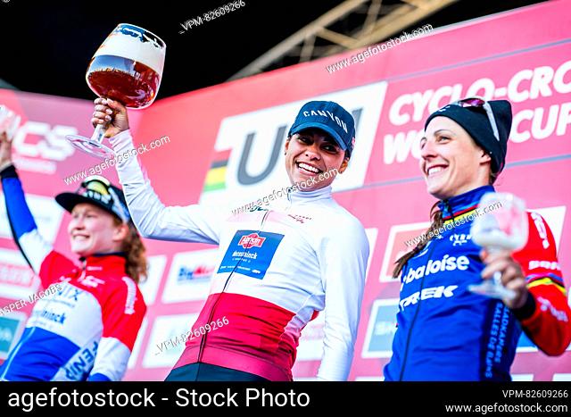 Dutch Puck Pieterse, Dutch Ceylin Del Carmen Alvarado and Dutch Lucinda Brand celebrate on the podium after winning the women's elite race at the World Cup...