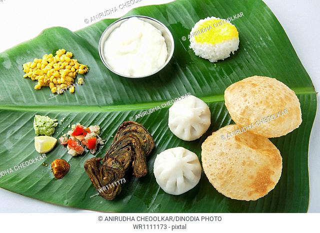 Maharashtrian food served on banana leaves India