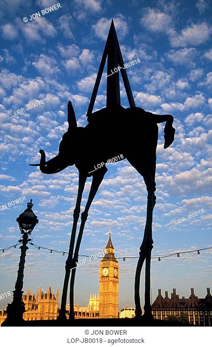England, London, South Bank, Dali statue and Parliament at sunrise