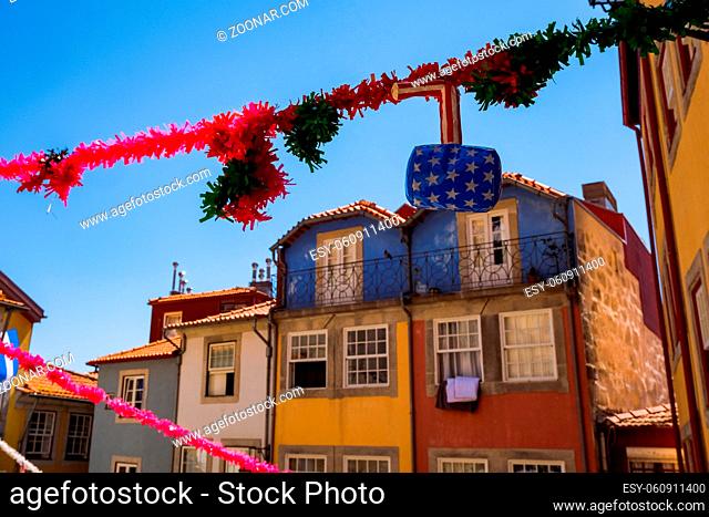 Porto, Portugal - Small Cobblestone Square with Traditional Colorful Houses with Popular Saints Decorations