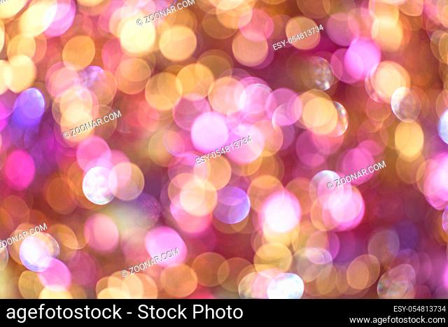 Background texture full of unsharp golden and pink shining bokeh blurring gradation design