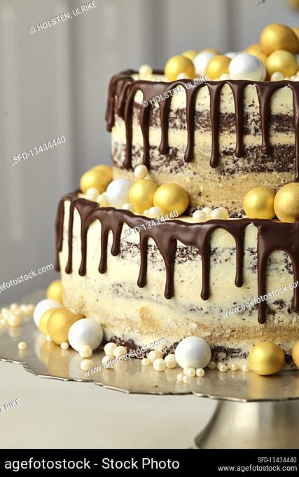Chocolate drip cake with caramel and espresso cream