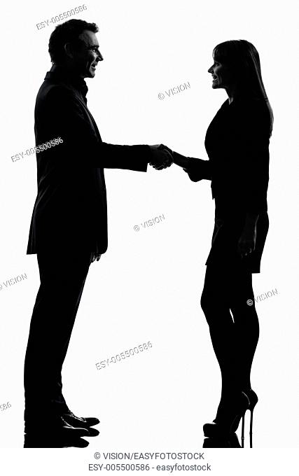 one caucasian couple business woman man handshake in silhouette studio isolated on white background