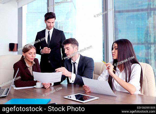 Business people working together at a meeting in modern office