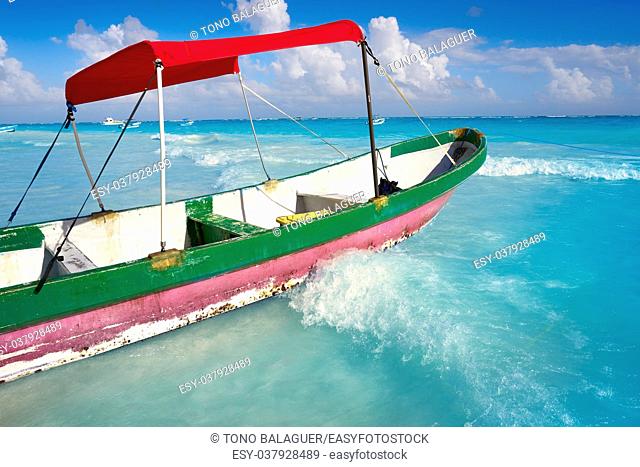 Tulum Caribbean turquoise beach boat in Riviera Maya of Mayan Mexico