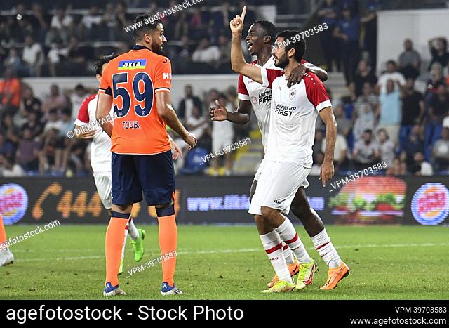 Antwerp's Dinis Almeida and Antwerp's William Pacho Tenorio celebrate after scoring during the match between Turkish team Istanbul Basaksehir and Belgian soccer...