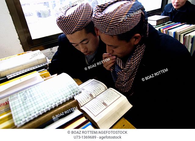 Hui Muslim boys studying the Qur'an in a Medressa in Gansu province