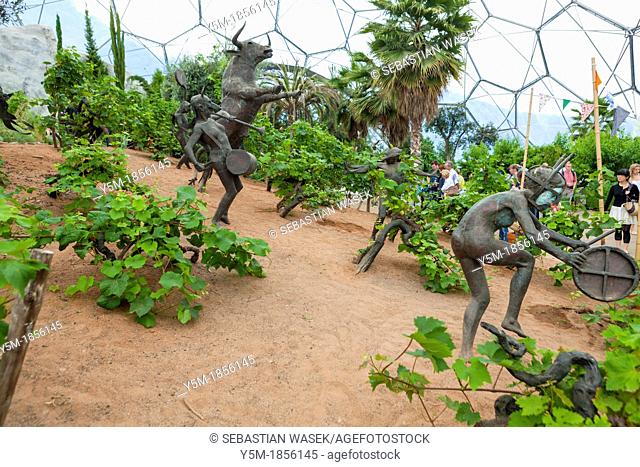 Sculptures depicting ancient Greek stories of Dionysius, among grape vines inside the Mediterranean Biome, Eden Project, Cornwall, England, UK, Europe