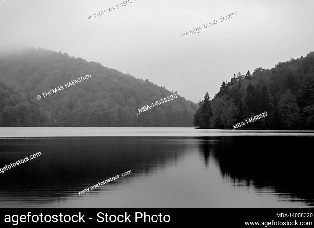 a lake in black and white - just breathtaking nature in plitvice lakes national park in croatia