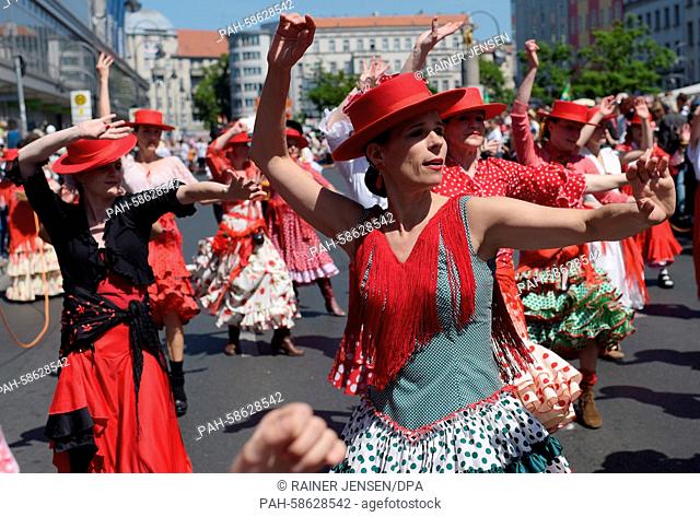 Members of the group Laura La Risa Ninas Y Flores dance in the parade at the Carnival of Cultures in Berlin,  Germany, 24 May 2015