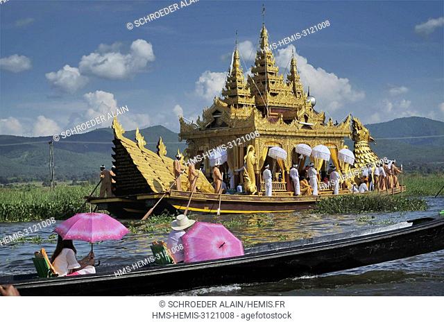 Myanmar, Shan State, Inle Lake, each year during the month of Thadingyut, around October, there is an 18-day festival during which four of the gold statues of...