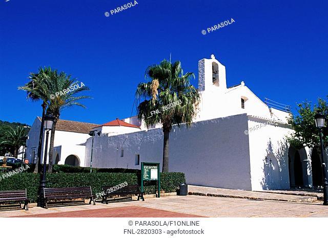 Palm trees in front of church, Es Canyar, Ibiza, Balearic Islands, Spain