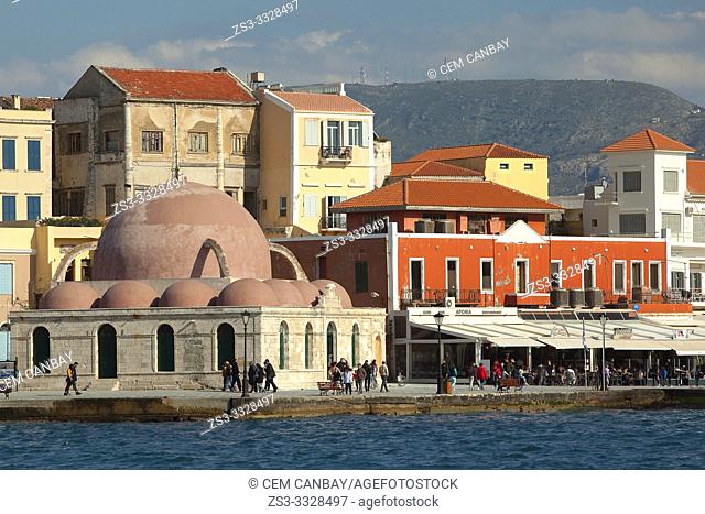 View to the Hassan Pasha Mosque and to the old Venetian buildings at the harbor, Chania, Crete, Greek Islands, Greece, Europe