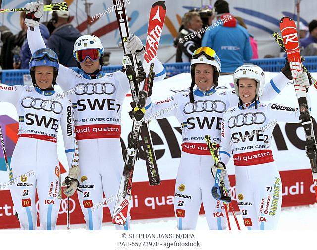 (L-R) Bronze medal winners Anna Swenn-Larsson, Andre Myhrer, Matthias Hargin and Maria Pietilae -Holmner of Sweden react after nation's team event at the Alpine...